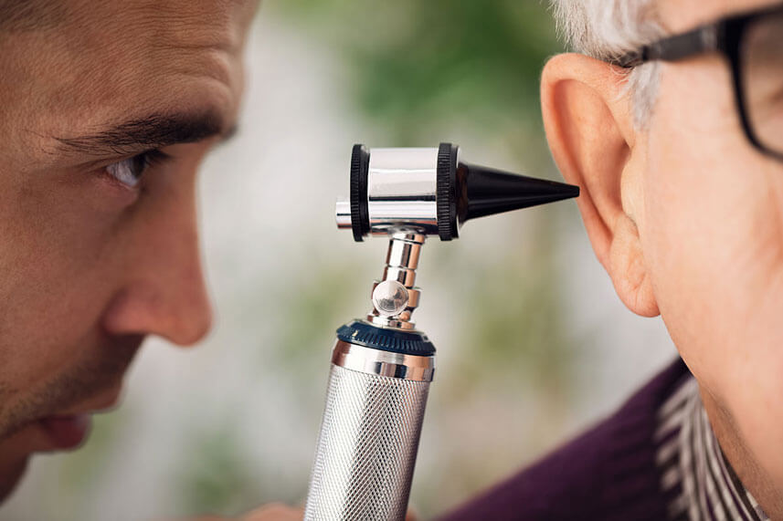 Doctor checking Ear