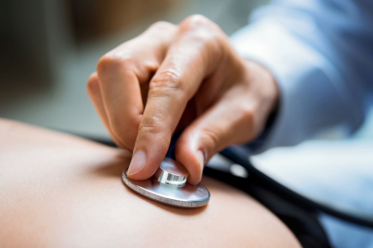 doctor holding stethoscope