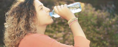 woman drinking water