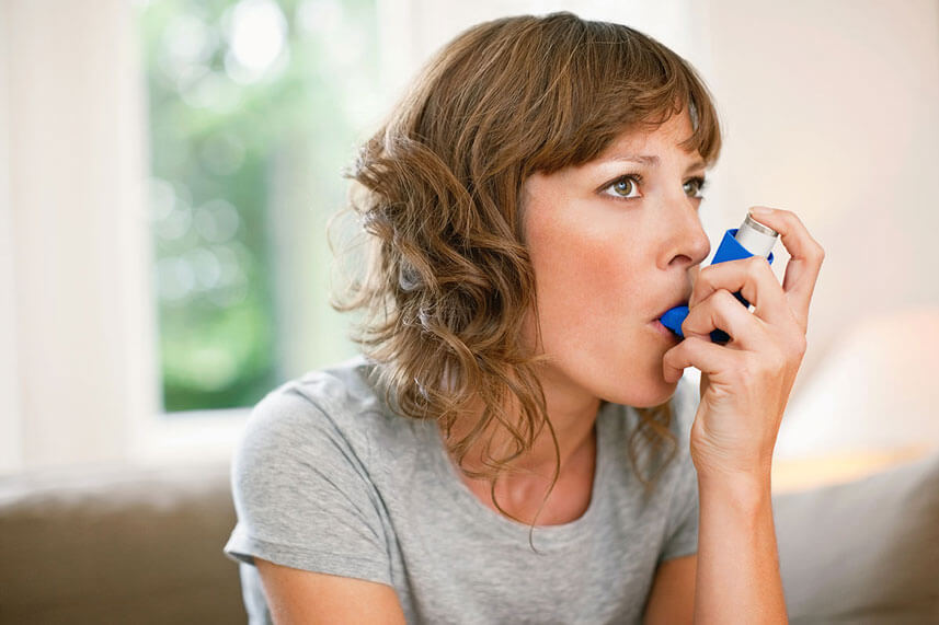 woman with inhaler